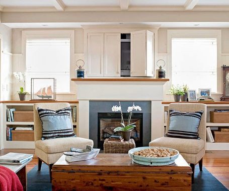 Living-room-built-in-doors-hiding-television-455x379