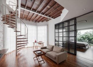 Spiral Staircase Elevates Minimalist Duplex in Thailand