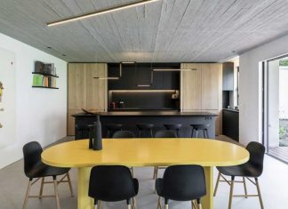 A Renovated Duplex in Paris With Two Rooms Hidden Behind Bookshelves