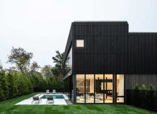 A Sag Harbor Hideaway With Black Slats Creating Privacy + Shade Screens