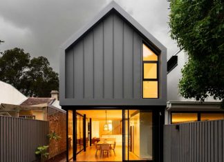 A Crumbling Cottage Becomes New With a Gabled Volume in Back