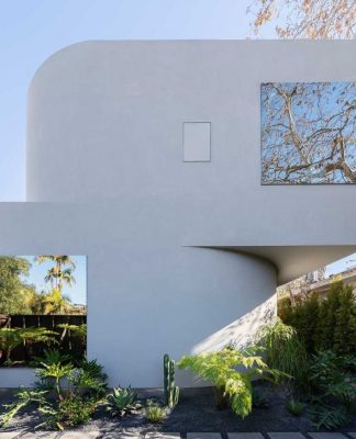 Pentagon Designs Radius House With Sharp Angles + Curved Surfaces