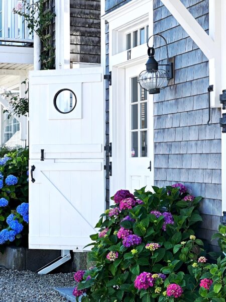 onion-lights-exterior-nantucket-cottage-lighting-hydrangeas-450x600