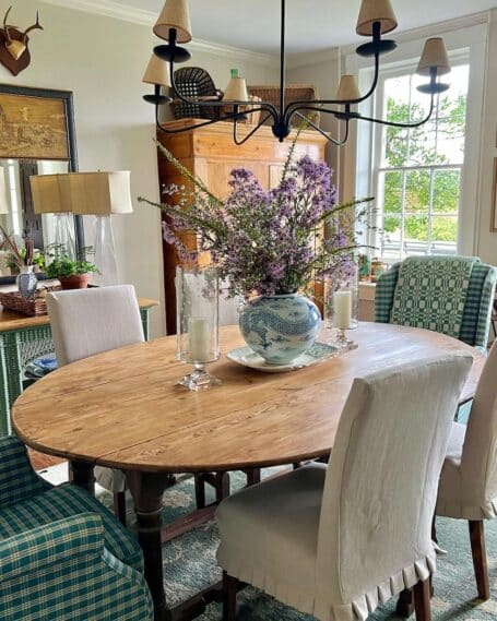 dining-room-chandelier-lampshades-plaid-green-wingback-chairs-blue-white-wood-table-slipcovered-parsons-455x569