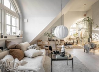 A Light and Airy Open-Plan Swedish Loft with Angled Ceilings