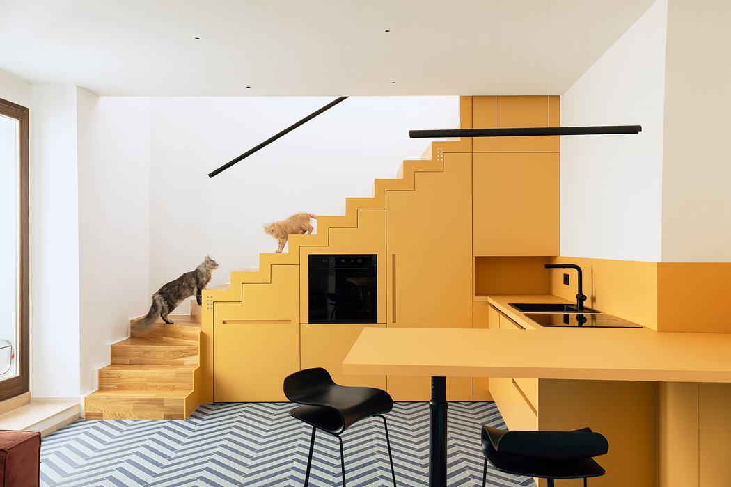 001-casa-mv-puts-a-yellow-stair-at-the-center-1050x700
